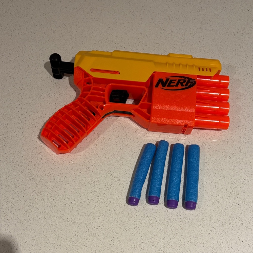 Nerf Yellow and Red Blaster with Blue Darts